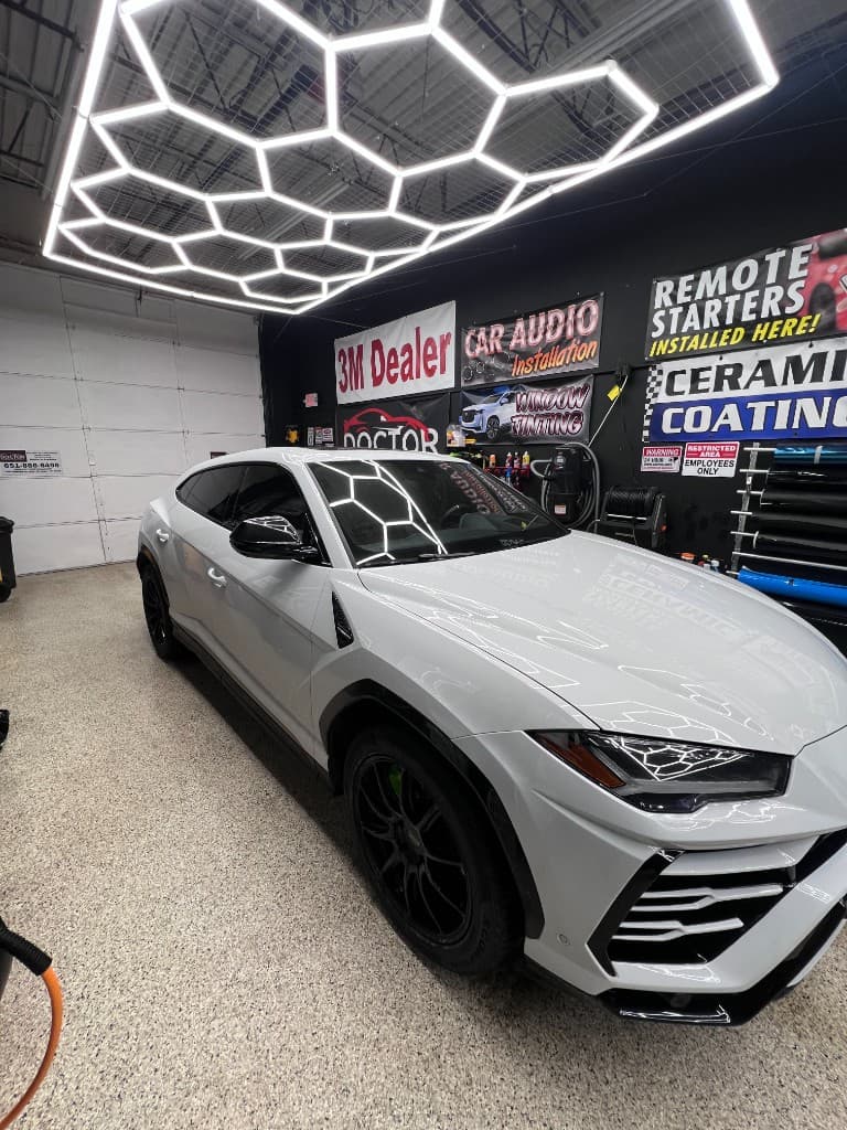 White Lamborghini Urus ceramic coating at Doctor Detail shop — Eagan MN