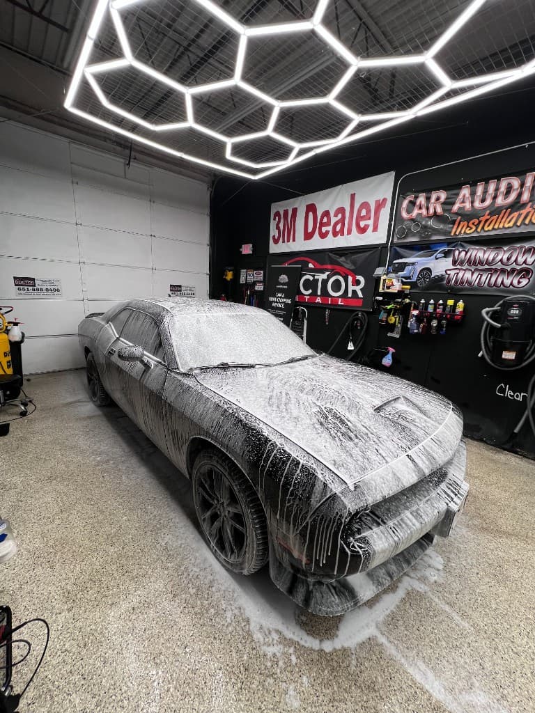 Snow foam exterior detail on Dodge Challenger at Doctor Detail shop — Eagan MN