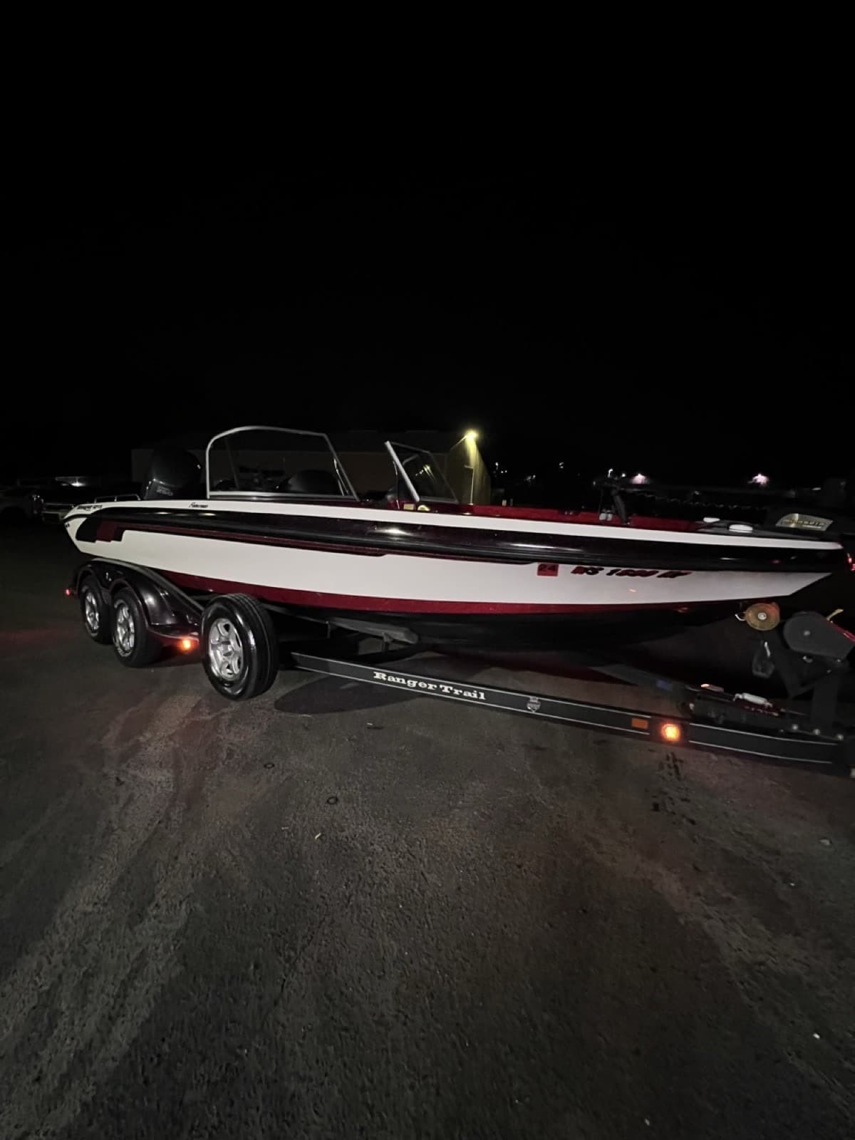 Ranger bass boat tint and detail on trailer at night — Doctor Detail Eagan MN