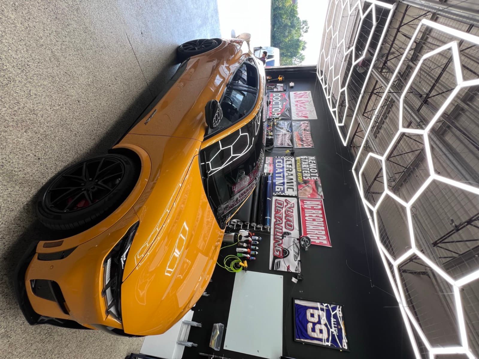 Orange luxury SUV at Doctor Detail — Eagan MN