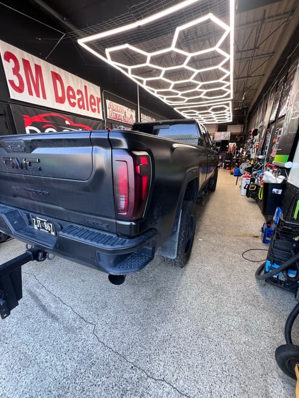 Matte black vehicle in Doctor Detail shop — Eagan MN