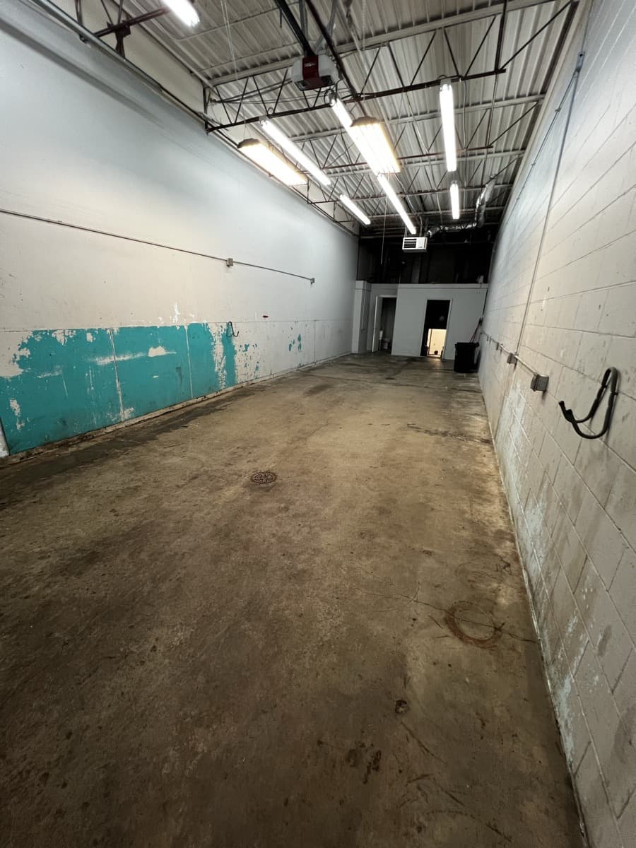 Doctor Detail Eagan MN shop before renovation — empty raw space